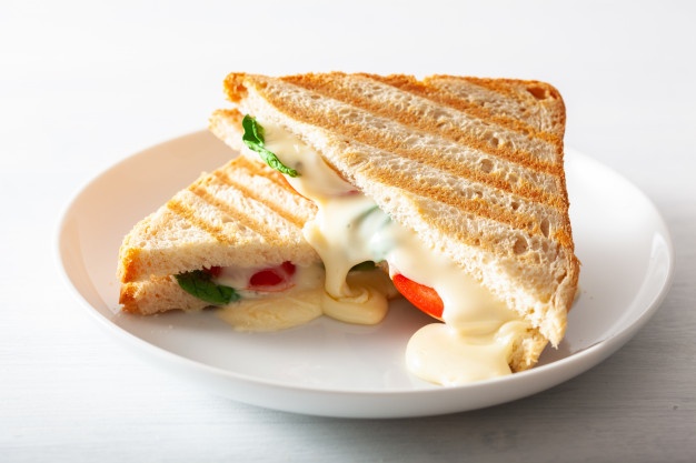 grilled-cheese-tomato-sandwich-white-background_214995-2900.jpg