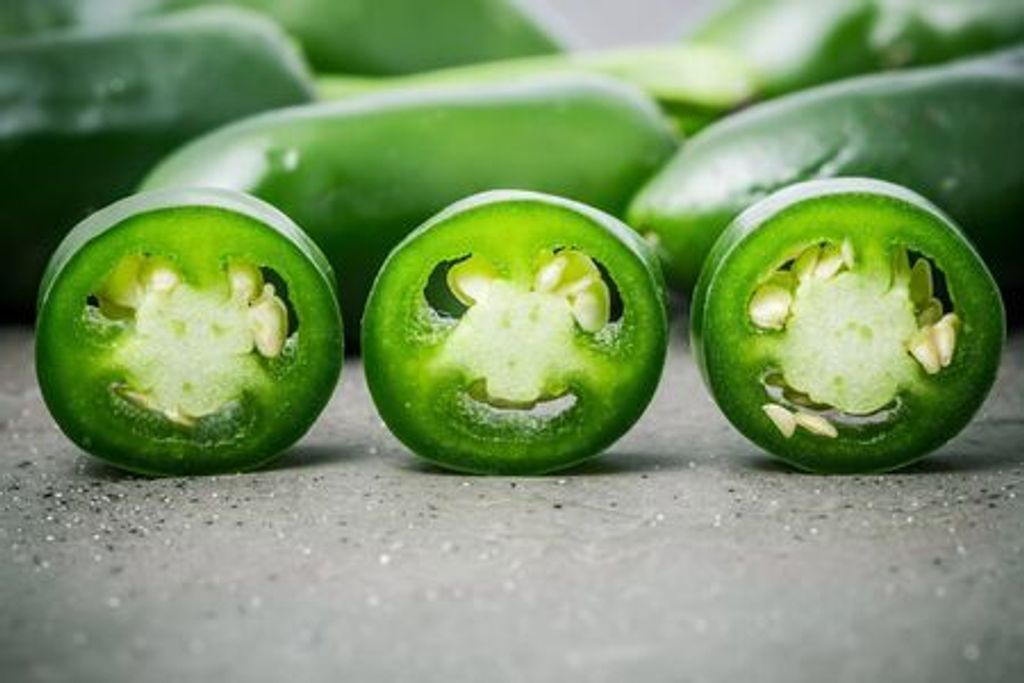 67978448-jalapeno-pepper-hot-green-background