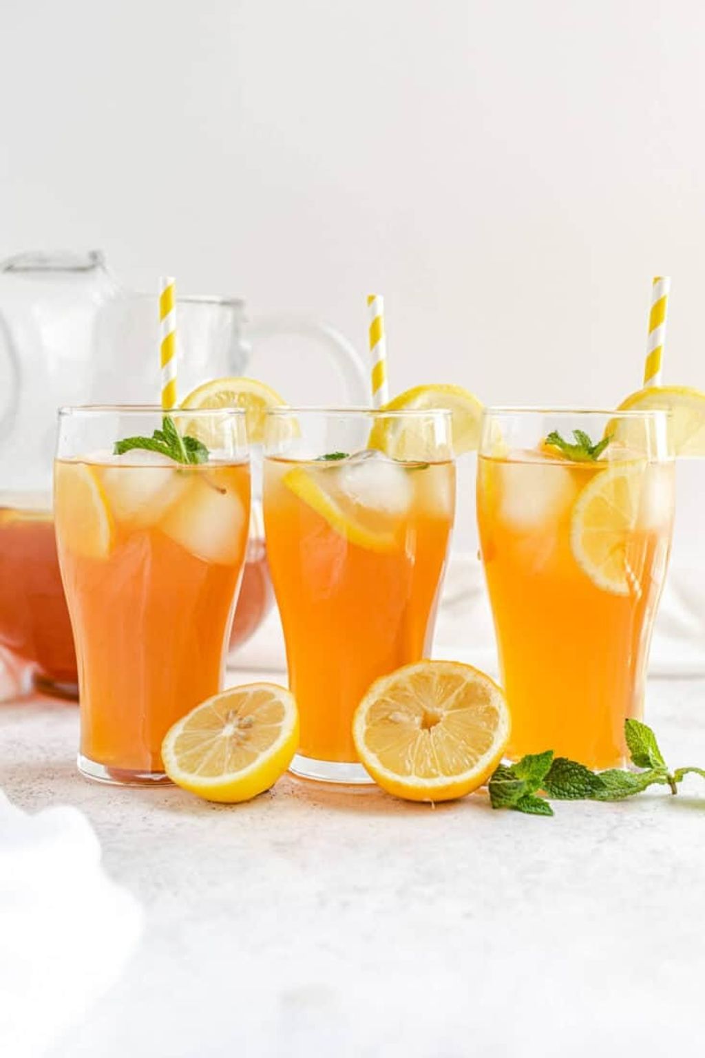 Homemade-Lemon-Iced-Tea-recipe-queensleeappetit.com-5-735x1103