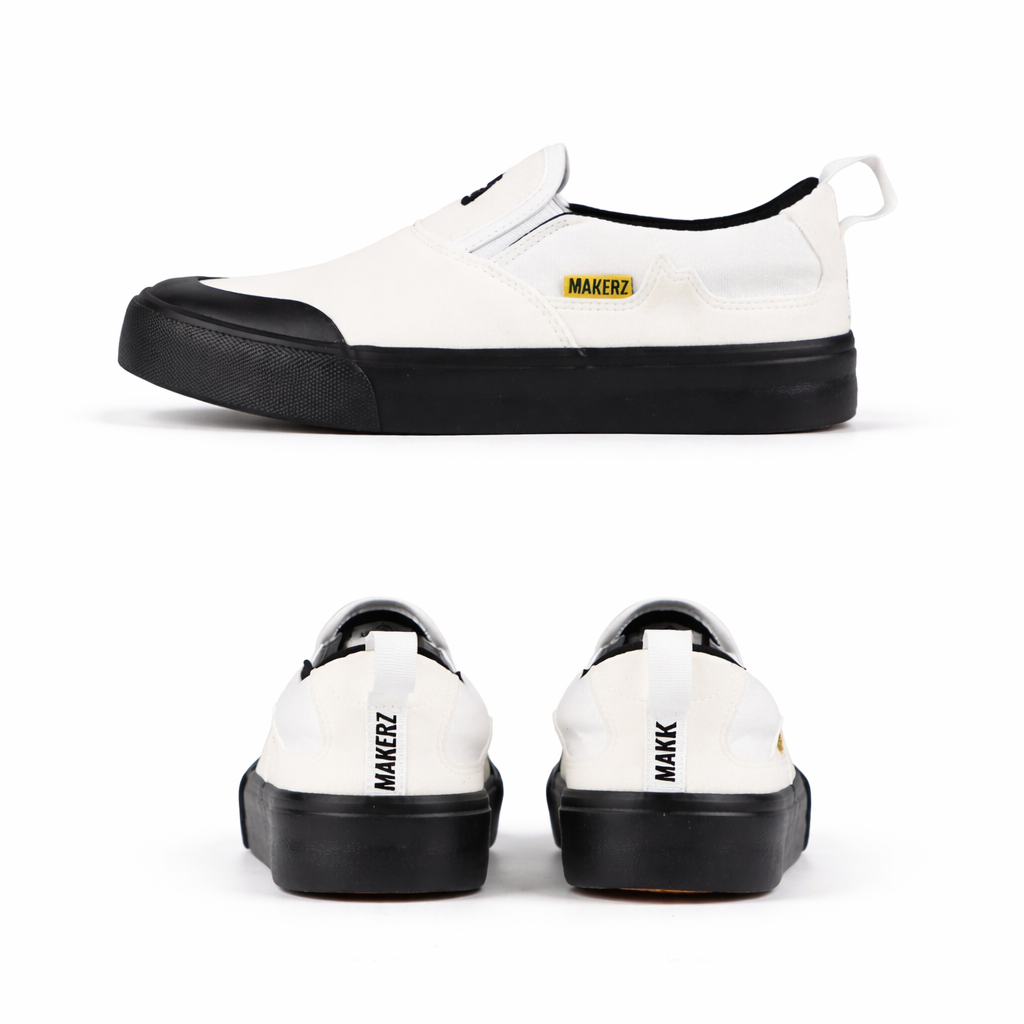 Sleek white slip-on sneakers with details
