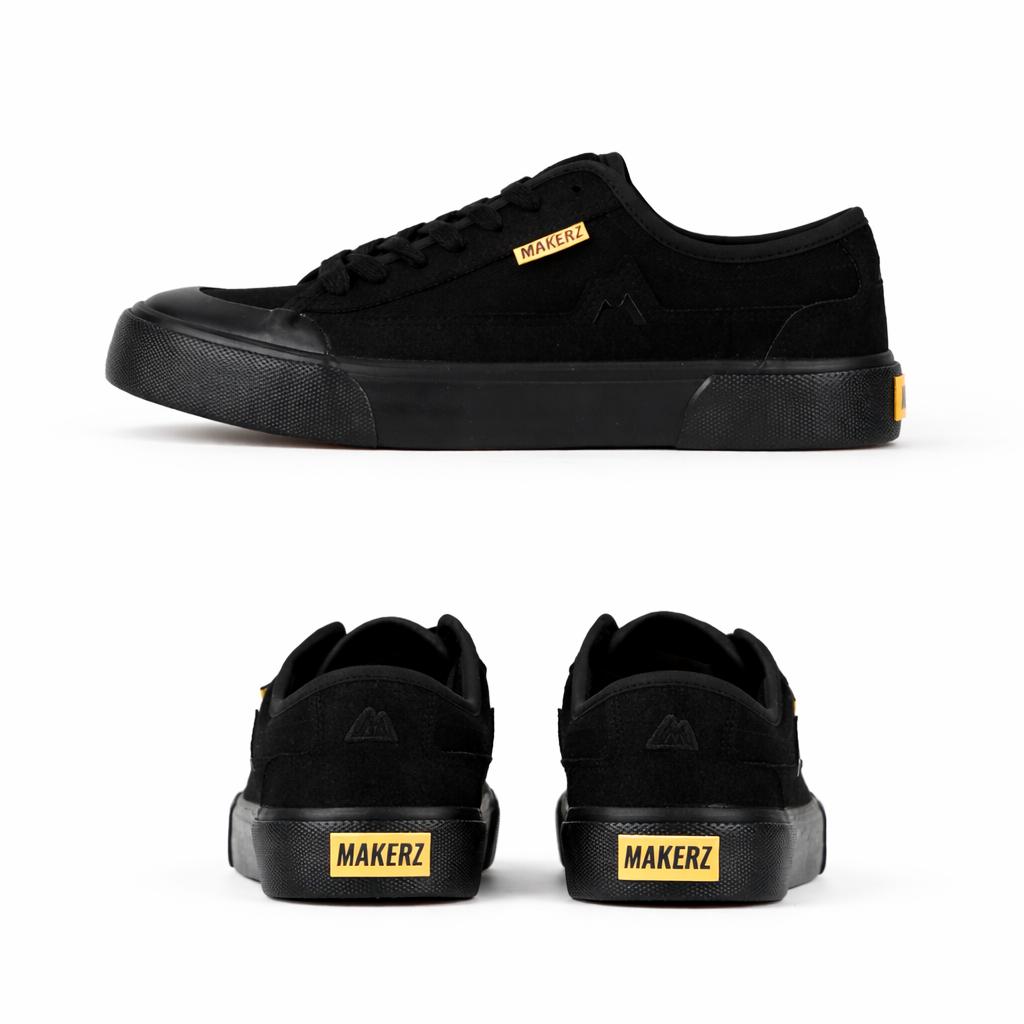 Black sneakers with yellow accents