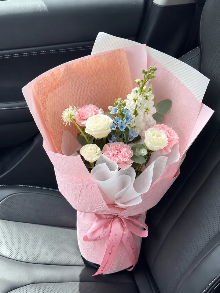 Pastel Bouquet on a Car Seat