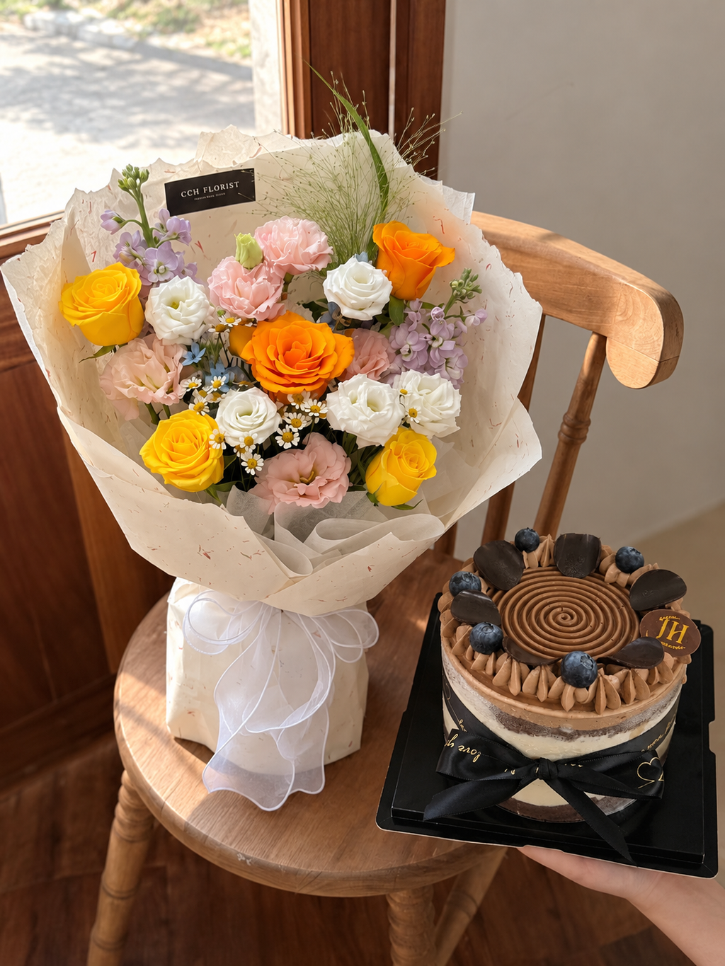 Bouquet and Chocolate Cake in Sunlight (1)