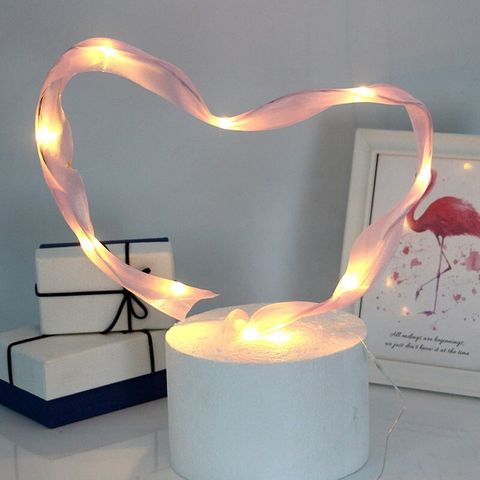 pink floating ribbon