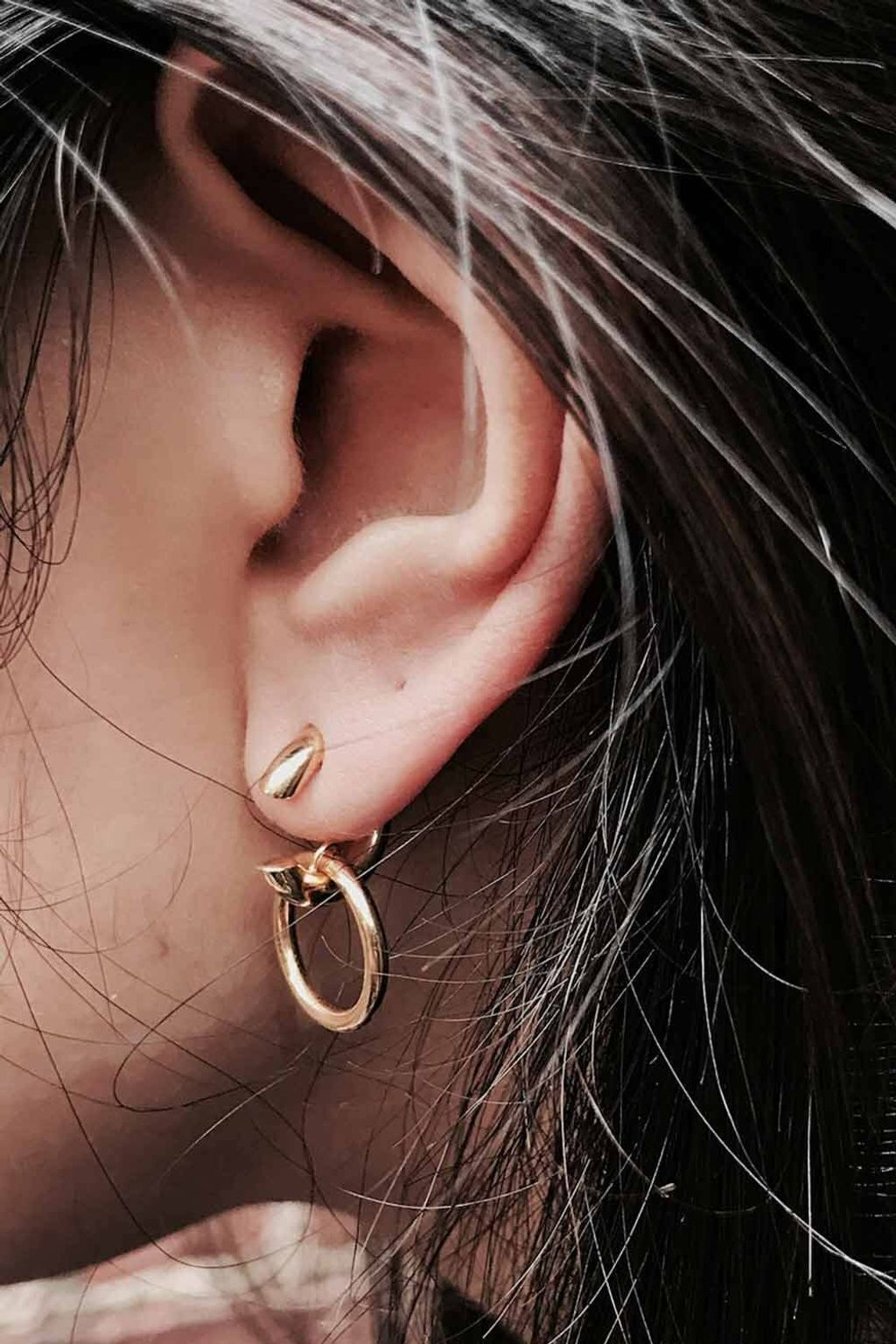 twin gold earring.jpeg