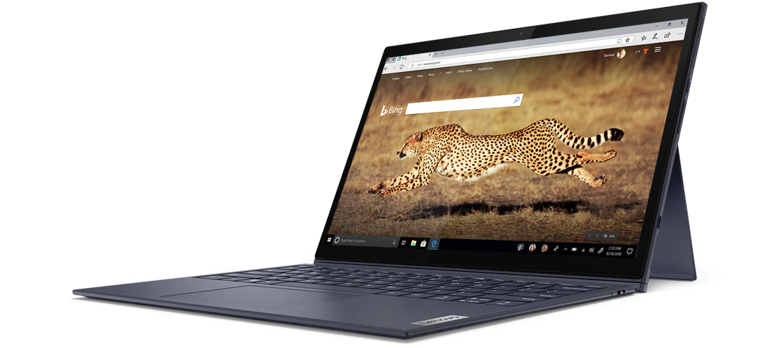 An open Yoga Duet 7i, showing the Bing browser and a running cheetah on screen