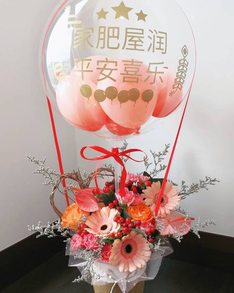 Bright Peach Grand Opening Flower Basket.jpg