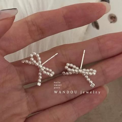 正韓優雅珍珠蝴蝶結耳環｜$480