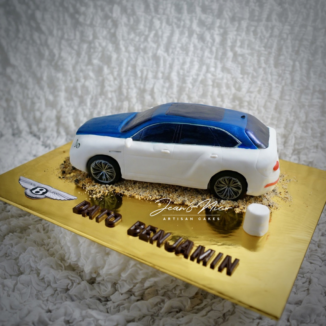 My first 3D Car cake! Lamborghini!! Windows, headlights and taillights are  isomalt! The whole cake is covered in modeling chocolate! : r/Baking