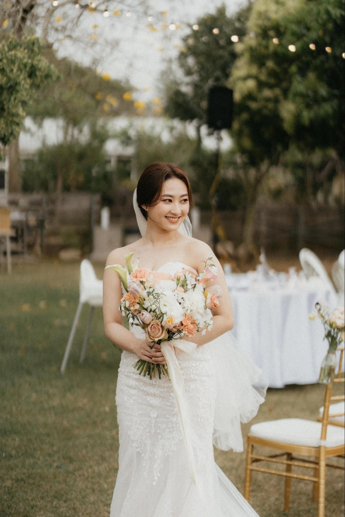 粉橘色系鮮花捧花