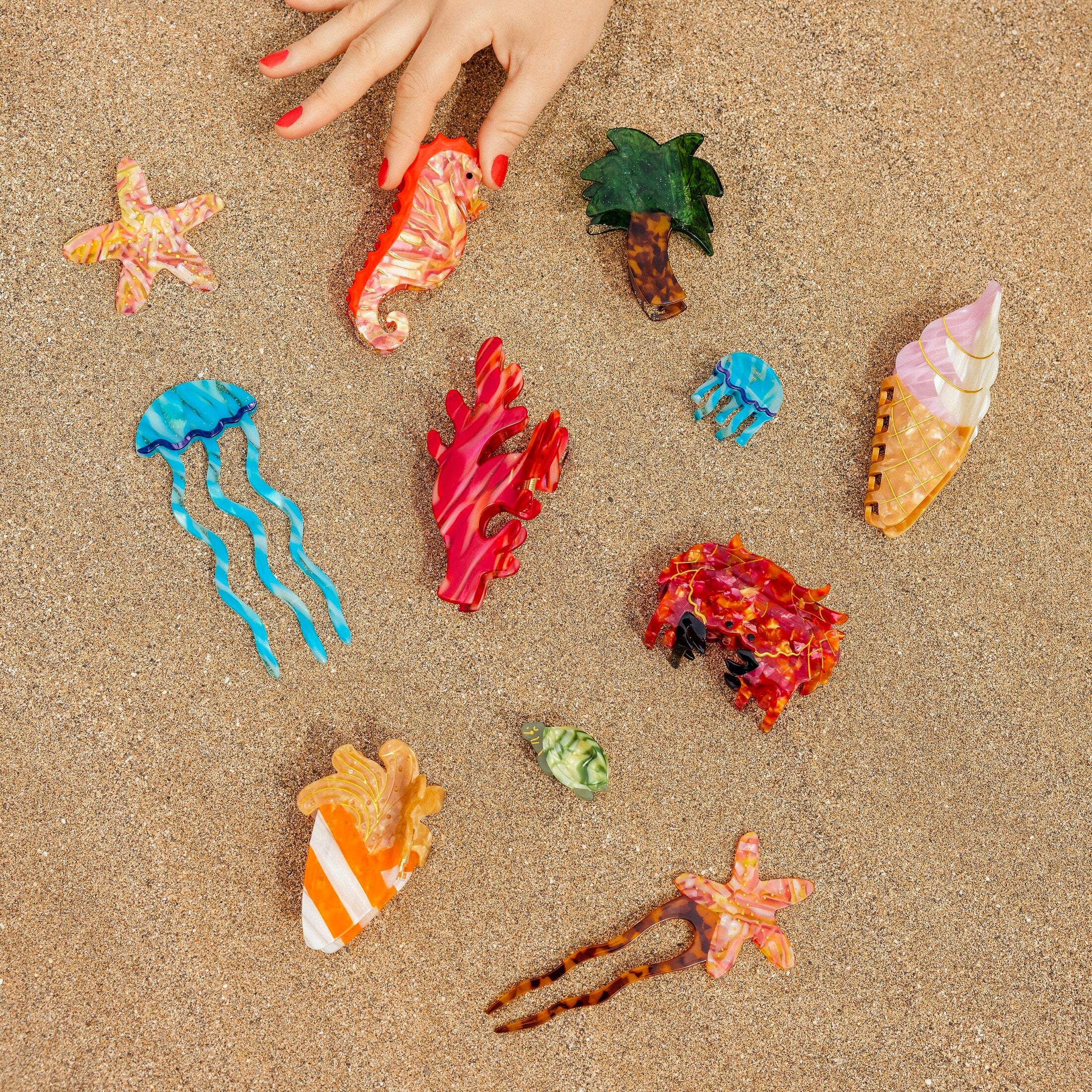 coucou-suzette-accessoire-accessory-cadeau-gift-tendance-trendy-fashion-ete-summer-plouf-splash-mer-sea-pince-cheveux-hair-claw-group-beach-plage-sable-sand