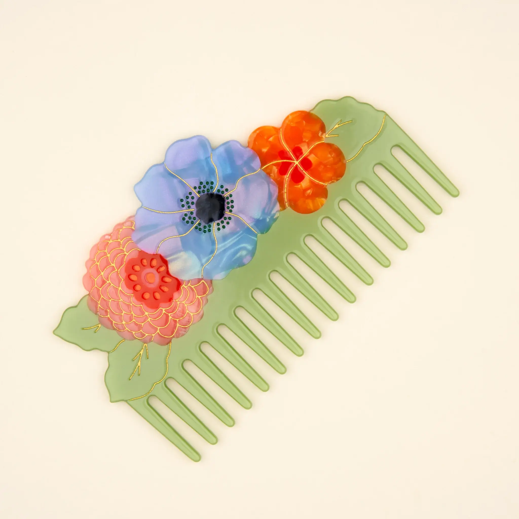 coucou-suzette-accessoire-accessory-cadeau-gift-tendance-trendy-fashion-ete-summer-collab-lucas-du-tertre-peigne-comb-acetate-floral-fleurs-flowers-bouquet-bleu-blue-orange-rouge-red