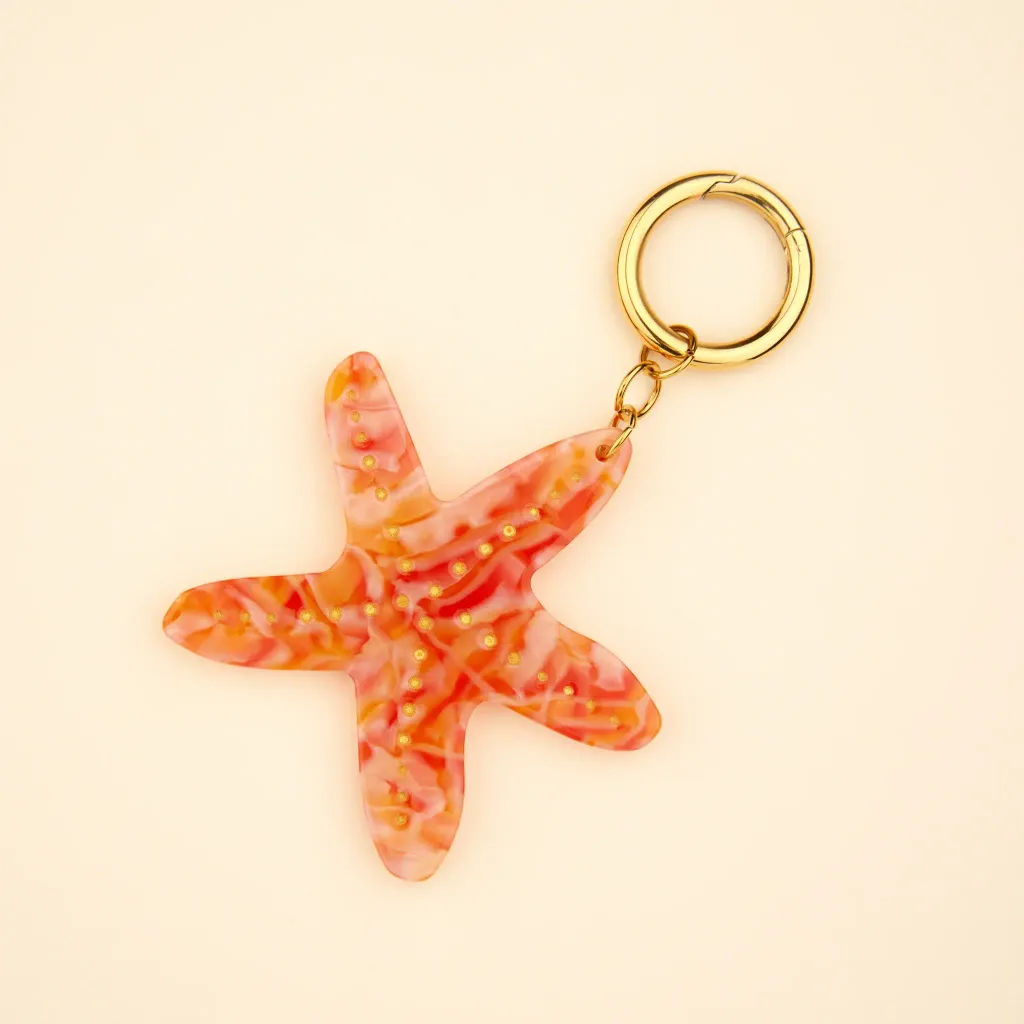 coucou-suzette-accessoire-accessory-cadeau-gift-tendance-trendy-fashion-ete-summer-plouf-splash-mer-sea-charm-charms-etoile-mer-starfish-orange