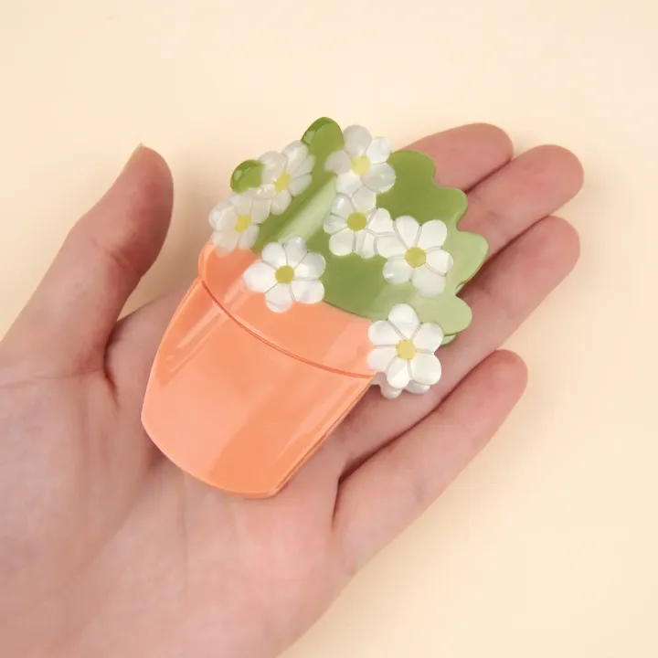coucou-suzette-accessoire-accessory-cadeau-gift-tendance-mode-trendy-fashion-joli-jardin-lovely-garden-pince-cheveux-hair-claw-printemps-spring-fleur-pot-flower-plant-orange-vert-blan_1b02b8ed-afde-4aae-8934-e971a3fbcc58