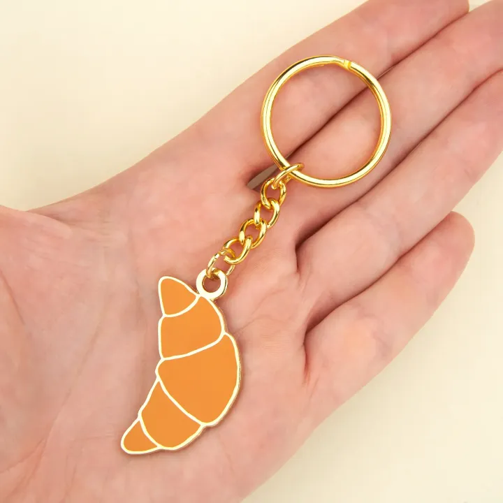 coucou-suzette-accessoire-accessory-cadeau-gift-tendance-mode-trendy-fashion-douce-france-french-frenchy-porte-cles-key-ring-croissant-beige-golden-dore1