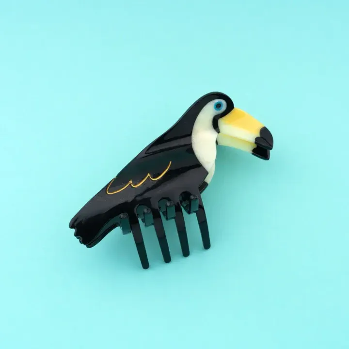 6973