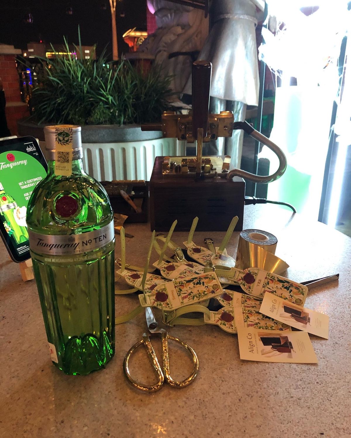 Crafting Exclusivity: Elevating Tanqueray Gin's Exclusive Event with Customized Bottle-Shaped Luggage Tags