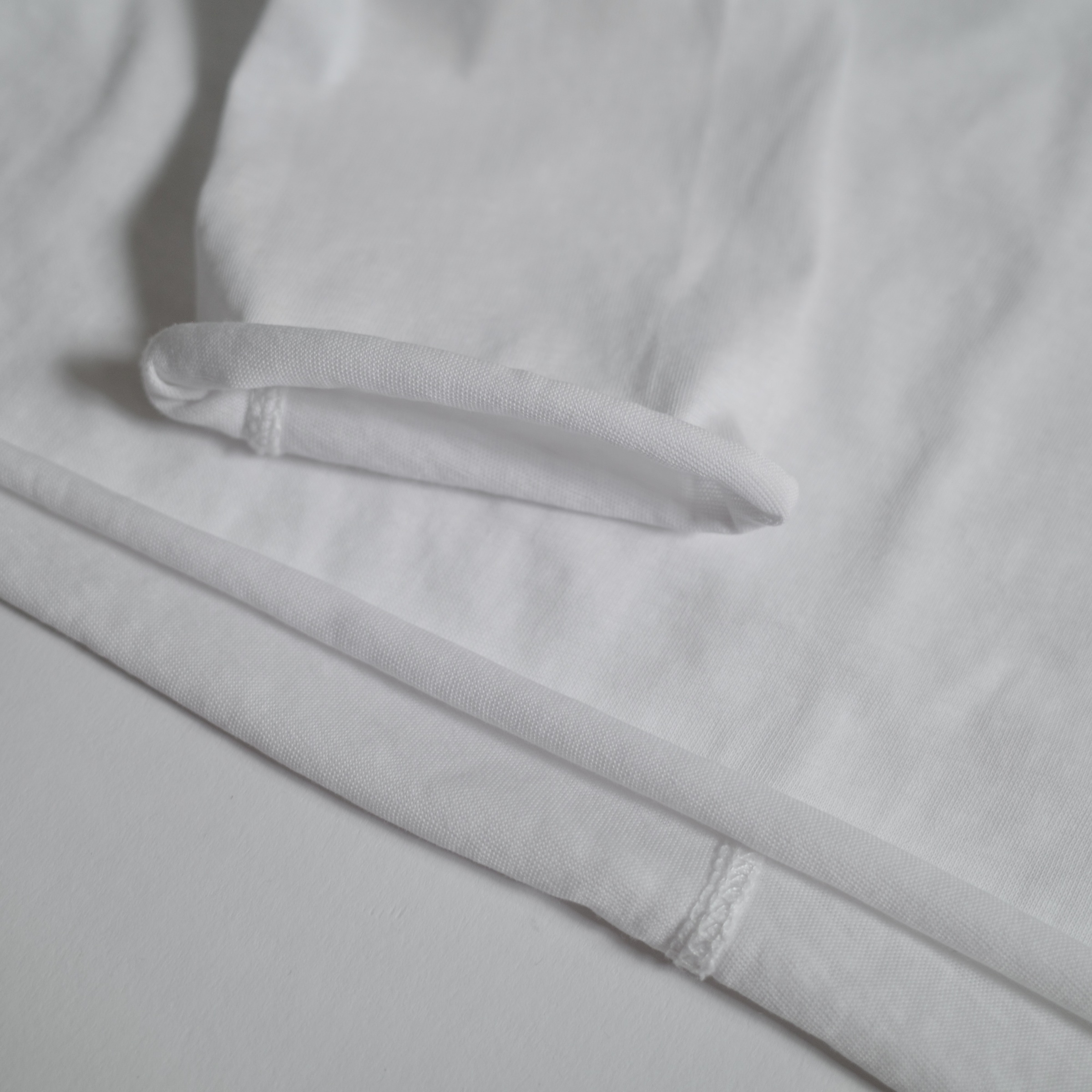 後中線捲邊薄透長袖上衣4