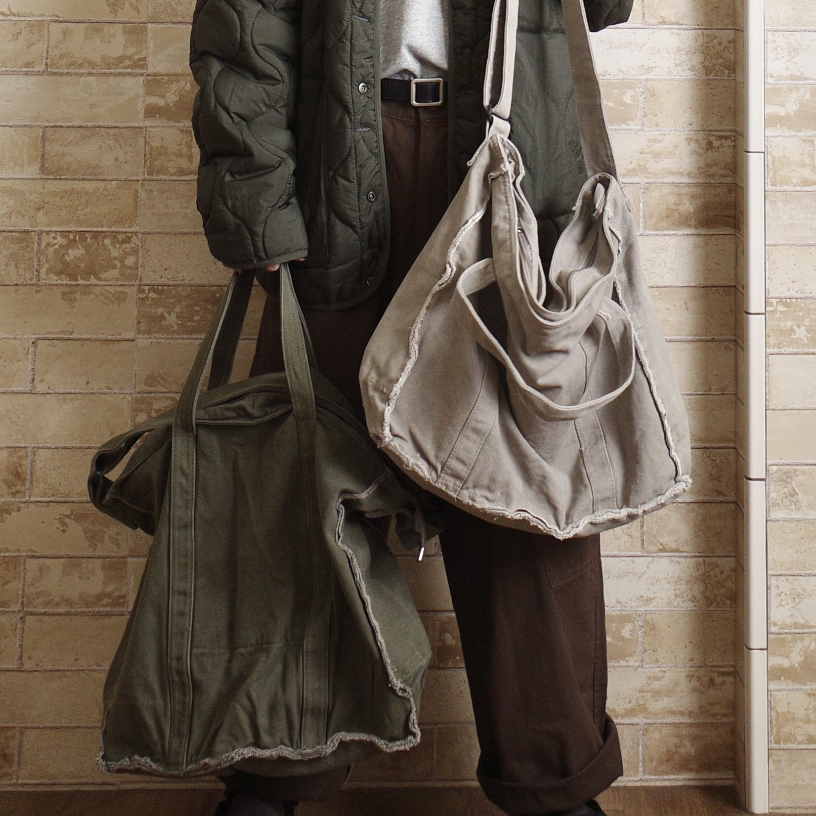 手提斜肩帆布大包包1