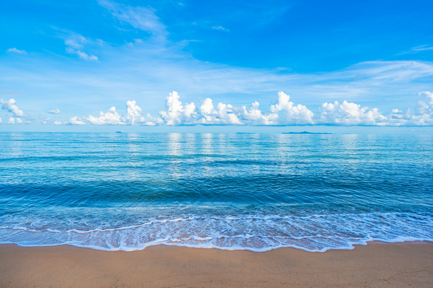 beautiful-tropical-beach-sea-ocean-with-white-cloud-blue-sky-copyspace