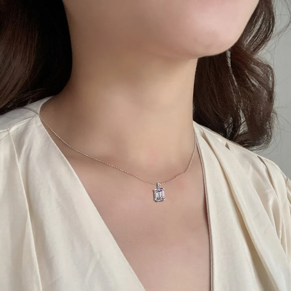 Fancy Collection Emerald Solitaire Diamond Pendant with Model.jpg