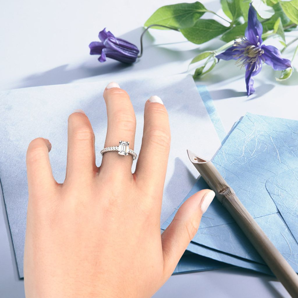 Emerald Elegant Diamond Ring with Hand.jpg
