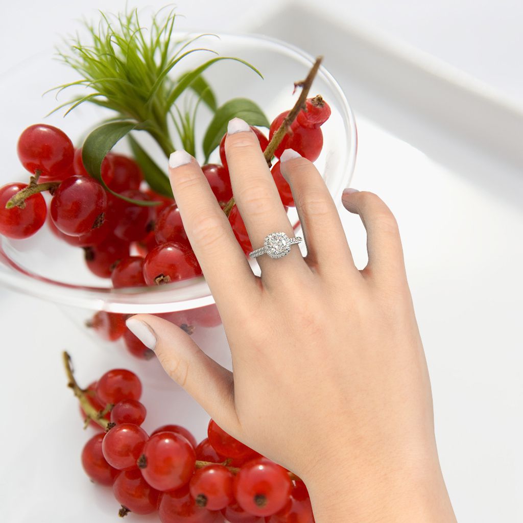 Cushion Halo Deluxe Diamond Ring with Hand.jpg