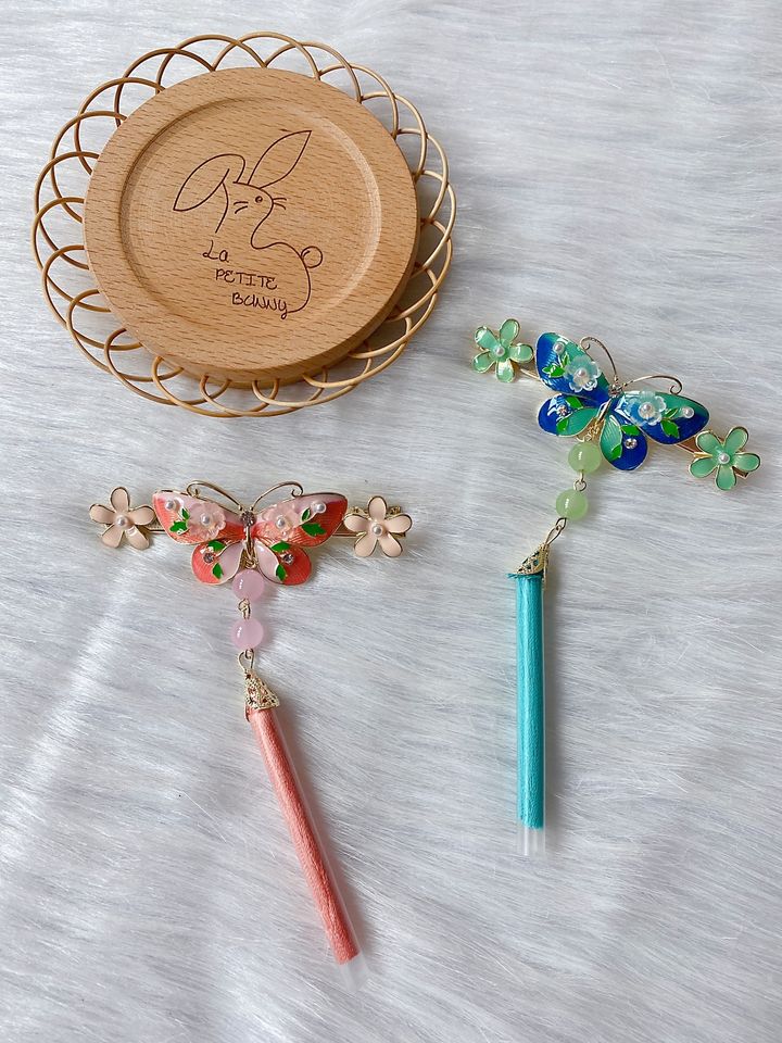 premium oil drop butterfly duck clip with tassel