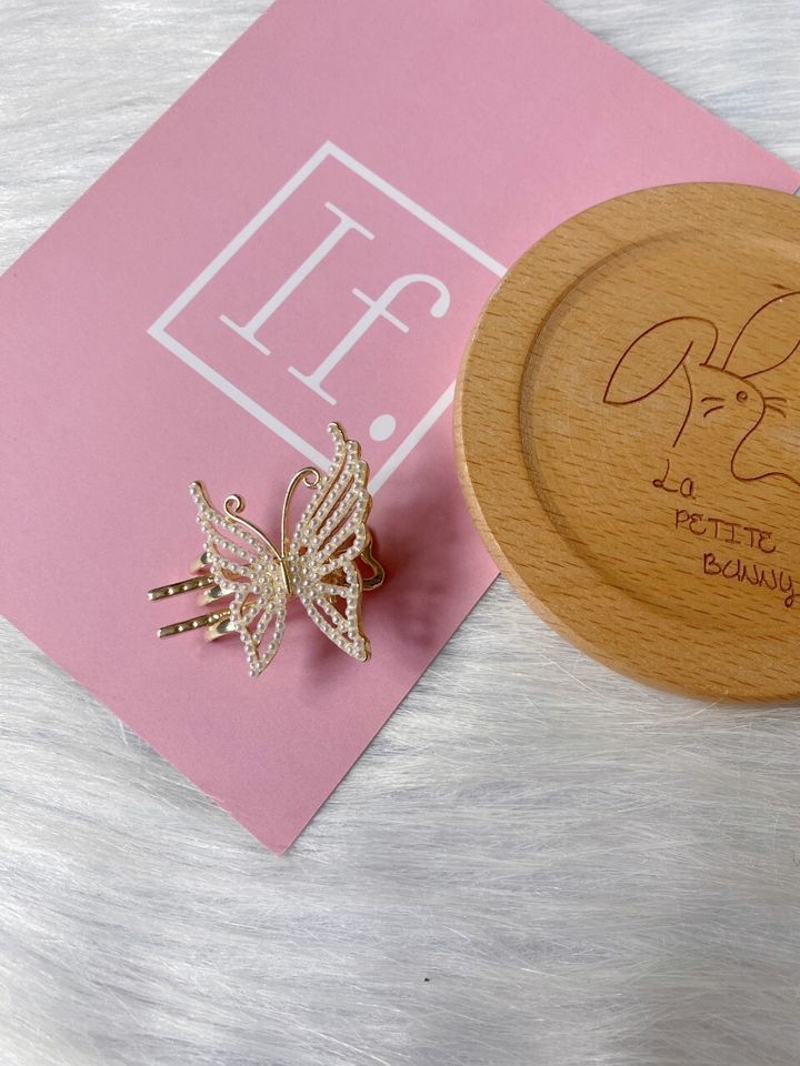 minimalist pearl butterfly clip