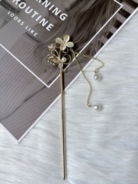 rotating cat eye stone flower hair bun stick