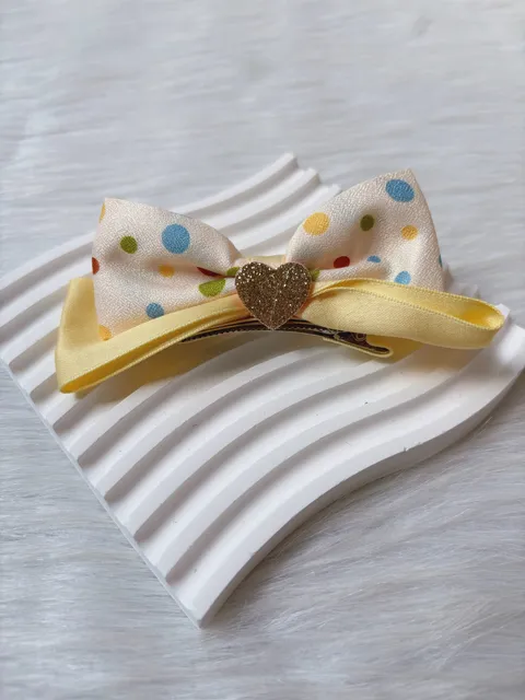colourful polka dot duck clip