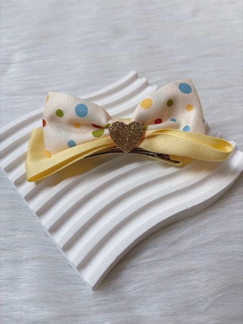 colourful polka dot duck clip