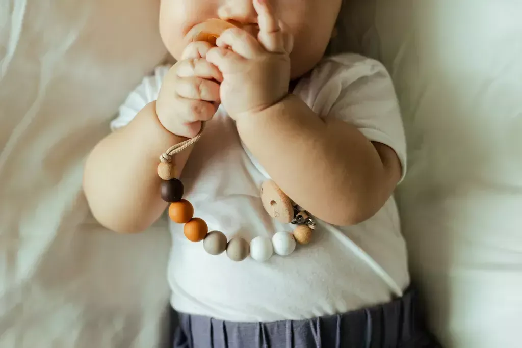 Mils & Key Pacifier Clip with Baby