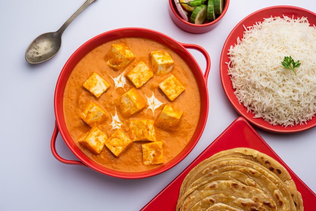 paneer-butter-masala-cheese-cottage-curry-served-with-rice-laccha-paratha.jpg