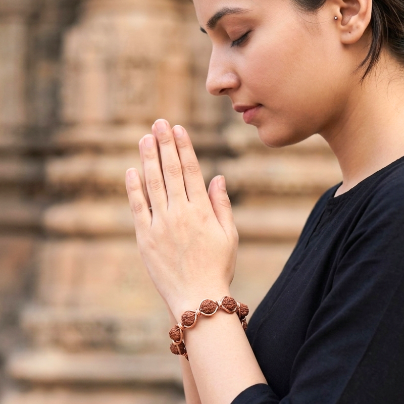 Radiant Twist Copper Bangle featuring Rudraksha - 5 Mukhi