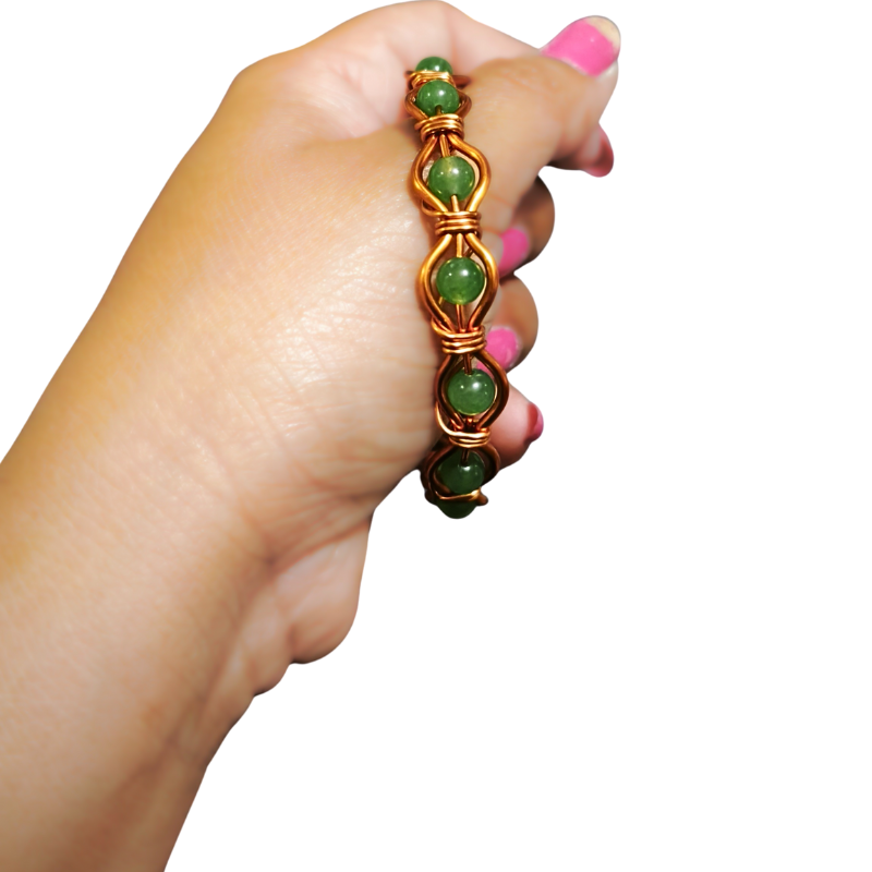 Radiant Twist Copper Bangle featuring Gemstones
