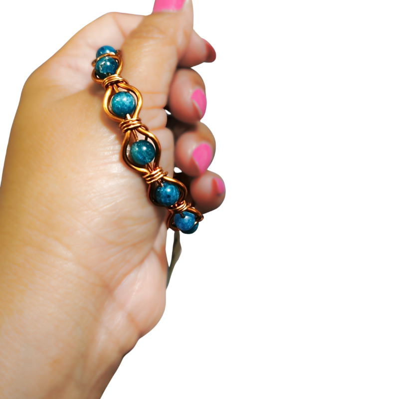 Radiant Twist Copper Bangle featuring Gemstones