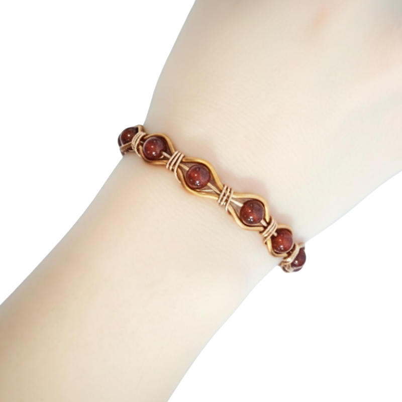 Radiant Twist Copper Bangle featuring Gemstones