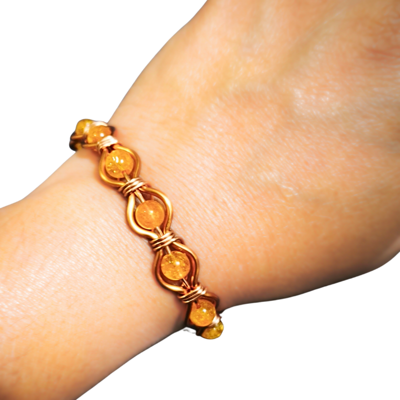 Radiant Twist Copper Bangle featuring Gemstones