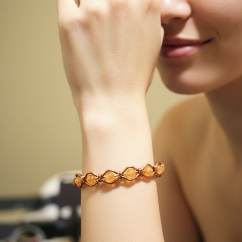 Radiant Twist Copper Bangle featuring Gemstones