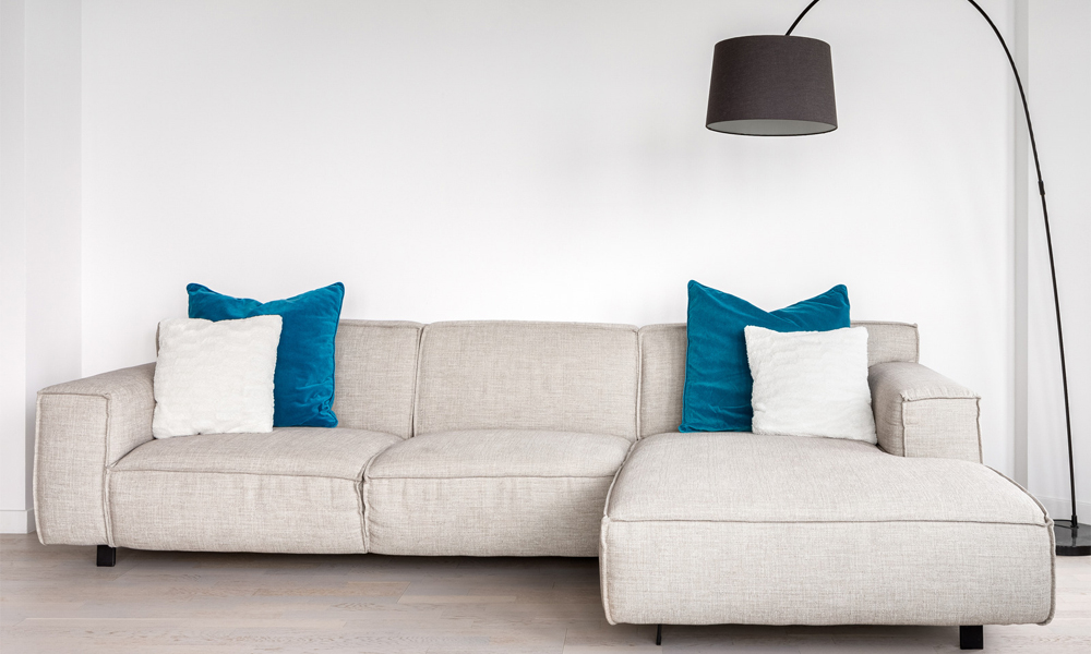 Nude low-seated sofa in living room