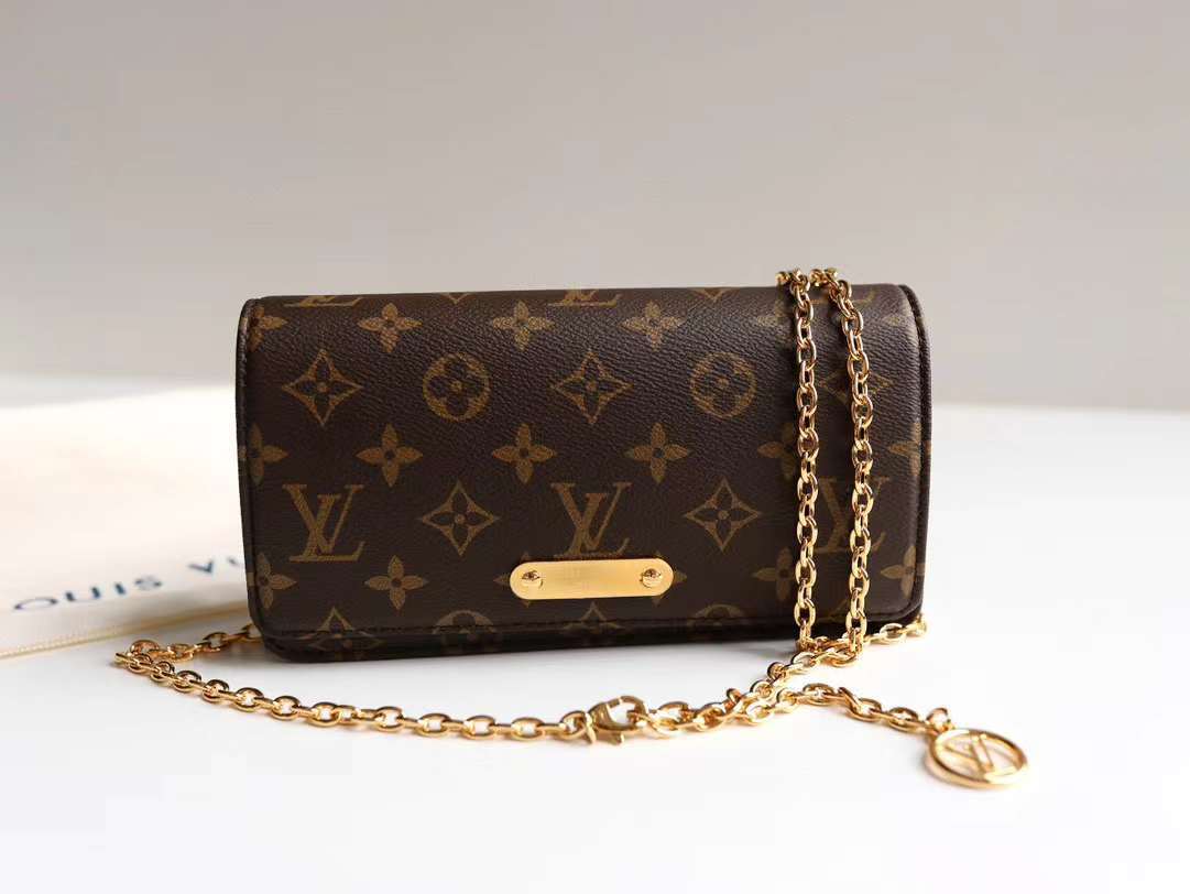 LV Lily Wallet On Chain in 2023  Lv wallet on chain, Lv wallet