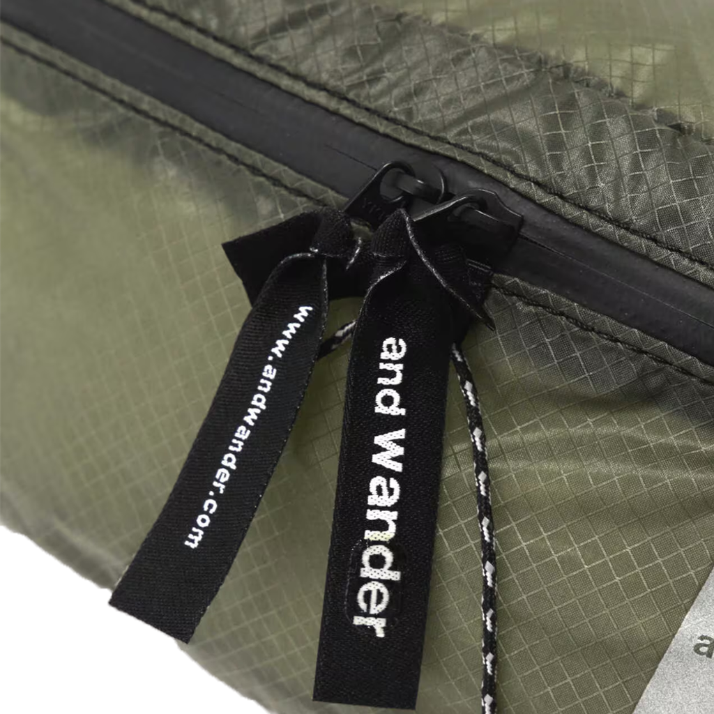 and wander green bag zip