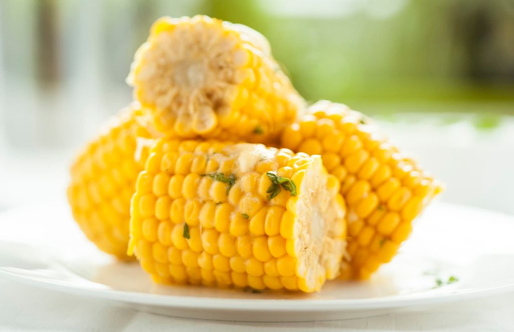 Corn-on-the-cob-with-garlic-and-chive-butter-iStock-171575379.jpg