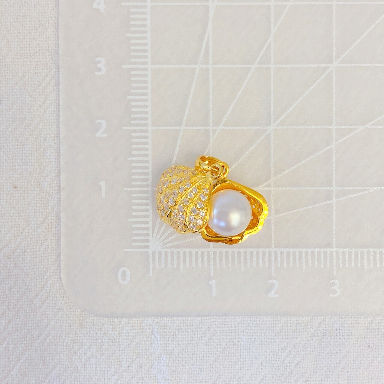 金瑞麟金飾》滿鑽珍珠貝殼黃金墜子純金9999 – 瑞麟銀樓(金瑞麟)