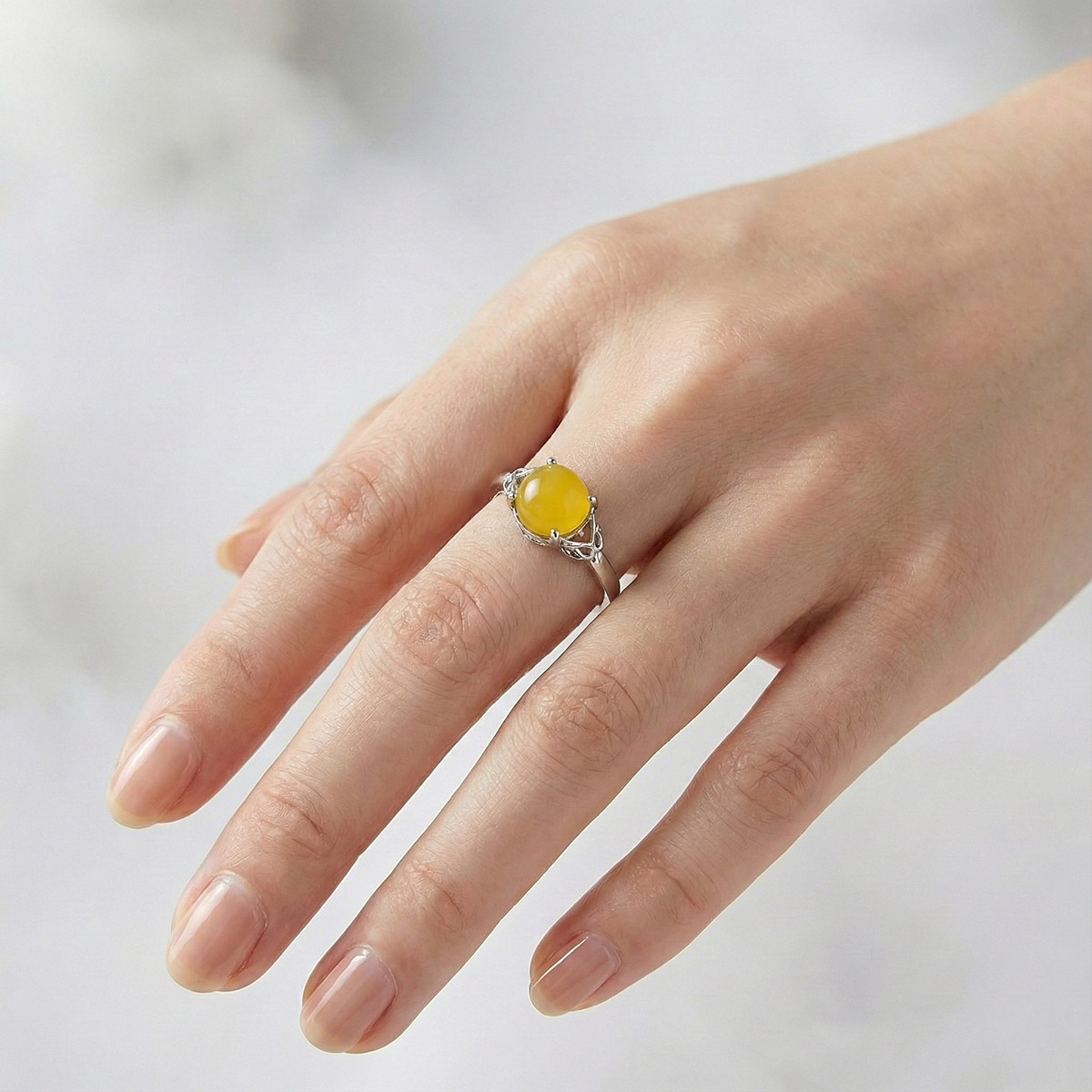 yellow-chalcedony-silver-ring-worn-hand