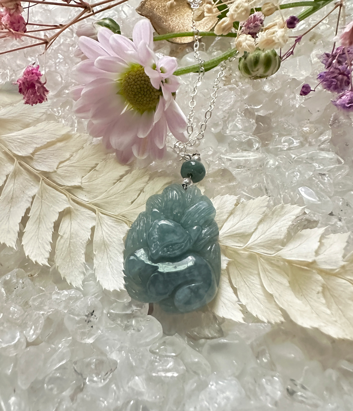 jade-nine-tailed-fox-necklace-floral-lifestyle