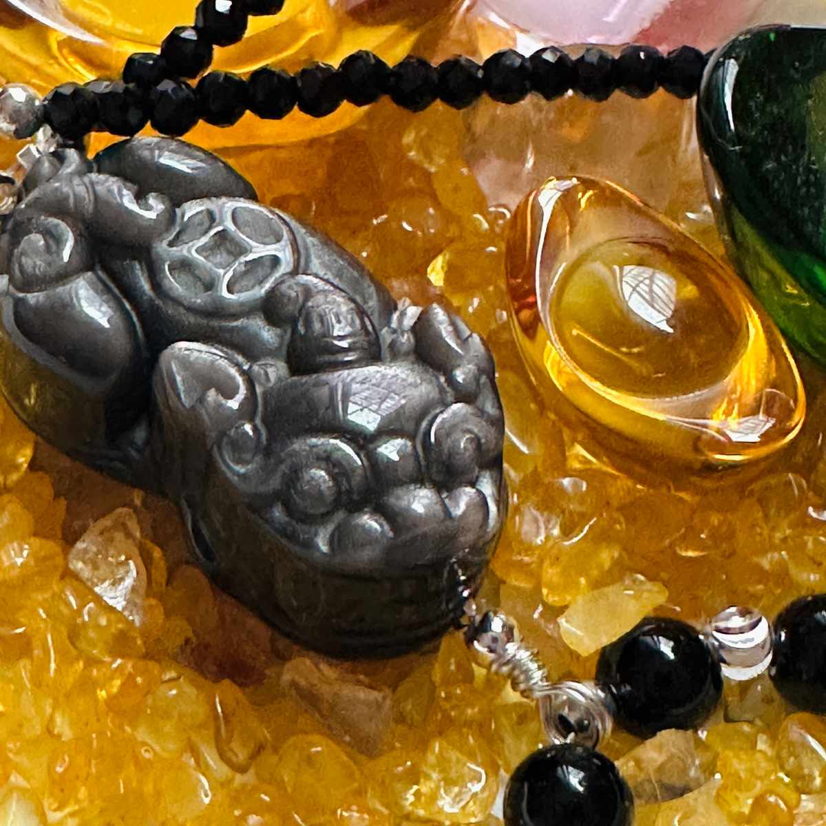 obsidian-pixiu-necklace-worn-closeup