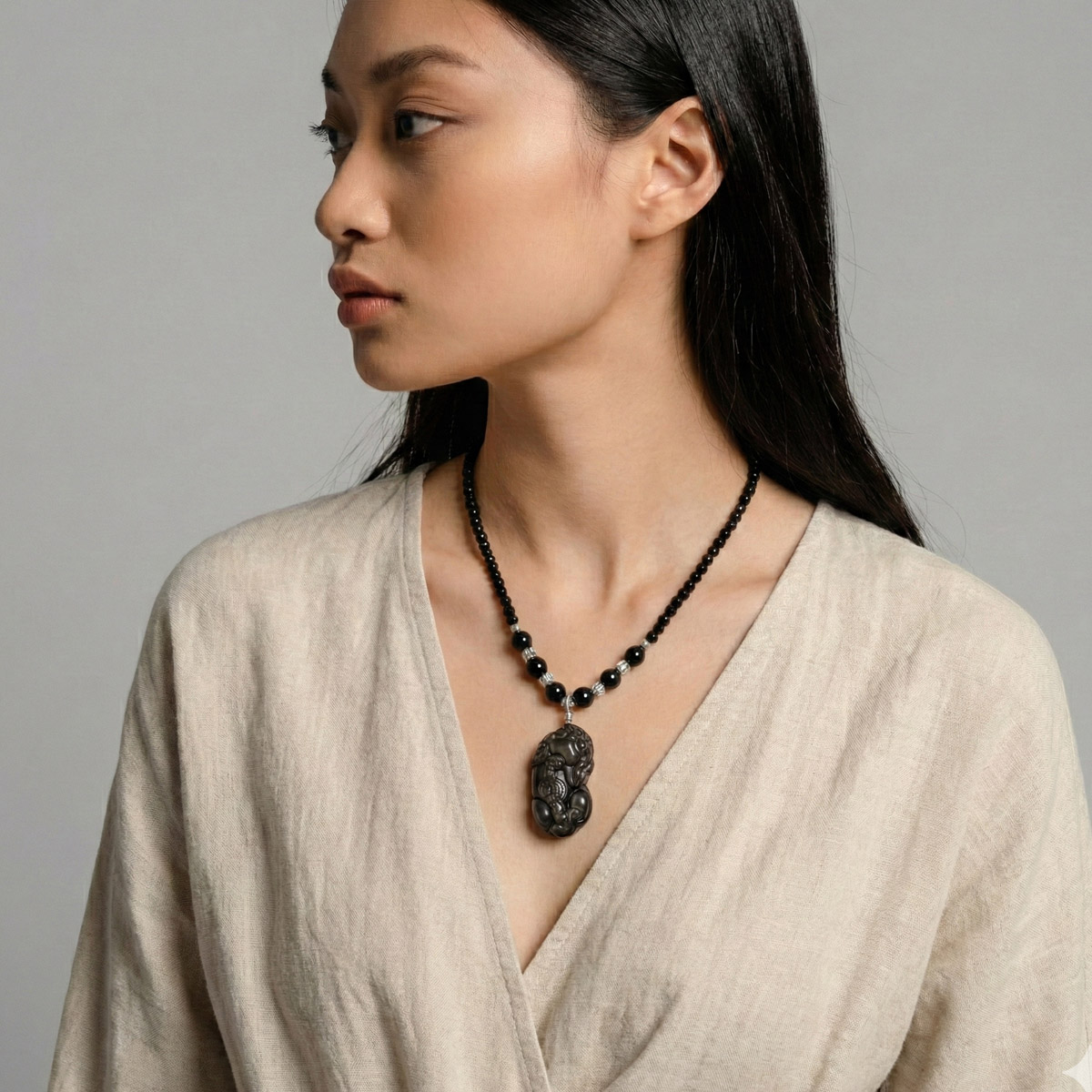 obsidian-pixiu-necklace-worn-model-side-view-1