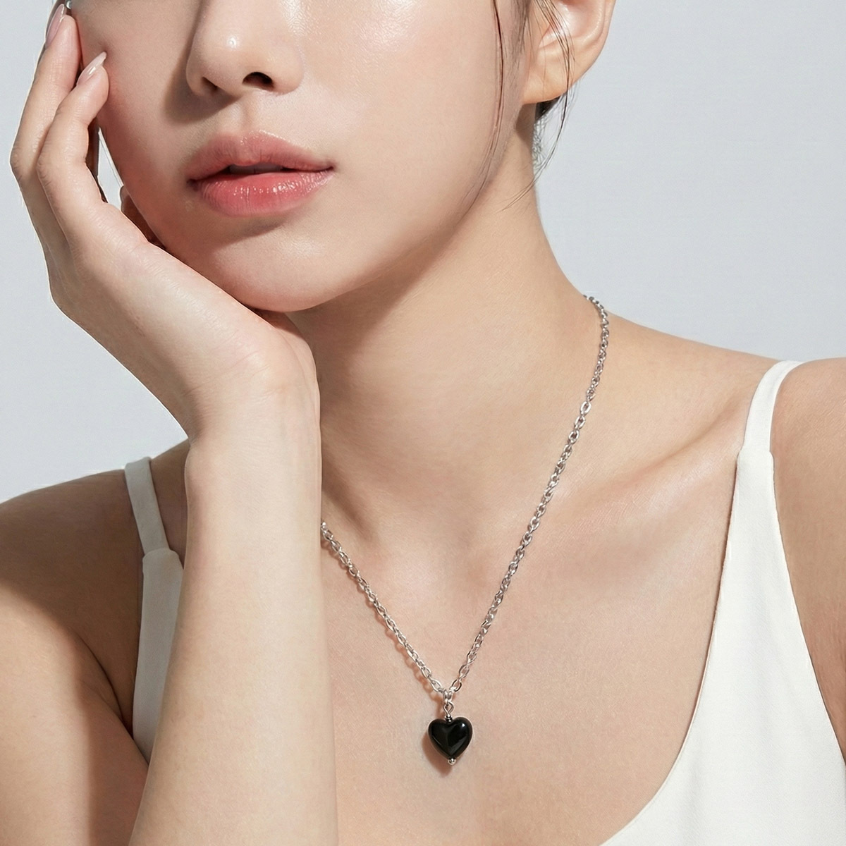 obsidian-heart-necklace-worn-minimal-style